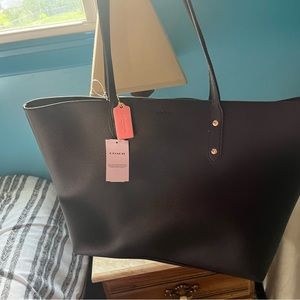This is a large coach purse paid 400 and asking 300 obo. This is brand new.